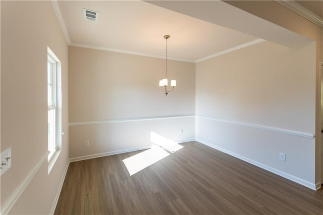 530 River Run Dr, Dallas, GA 30132 - empty room with dark wood-type flooring, plenty of natural light, baseboards, crown molding, and a chandelier