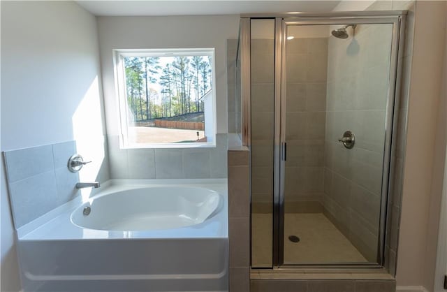 530 River Run Dr, Dallas, GA 30132 - bathroom with a garden tub and a stall shower