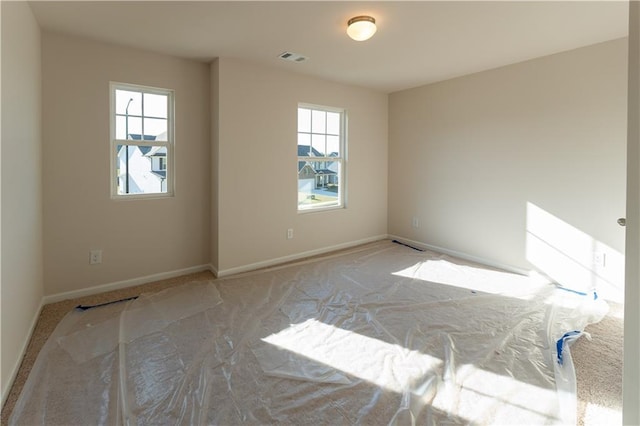 530 River Run Dr, Dallas, GA 30132 - carpeted spare room featuring baseboards