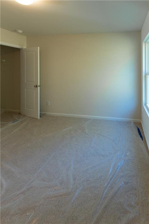530 River Run Dr, Dallas, GA 30132 - empty room featuring baseboards and light colored carpet