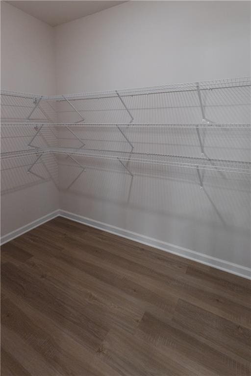530 River Run Dr, Dallas, GA 30132 - spacious closet featuring dark wood-style flooring