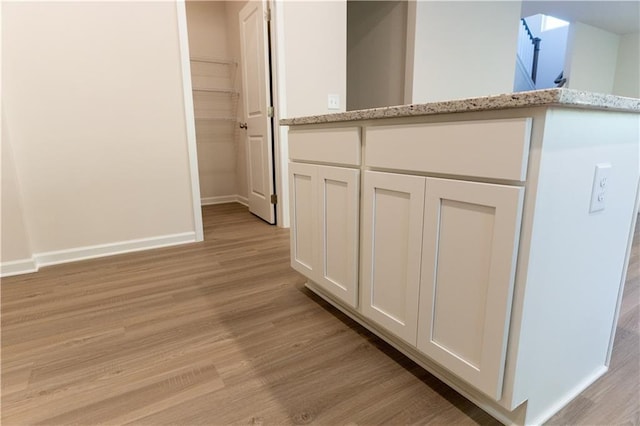 530 River Run Dr, Dallas, GA 30132 - detailed view of wood finished floors and baseboards