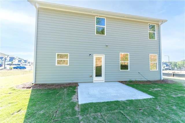 530 River Run Dr, Dallas, GA 30132 - back of property with a patio area and a yard