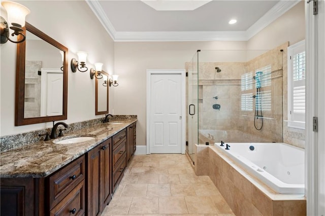 bathroom with a sink, a tub with jets, a shower stall, and crown molding