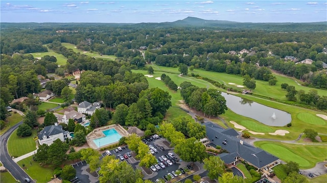 aerial view featuring view of golf course and a water view