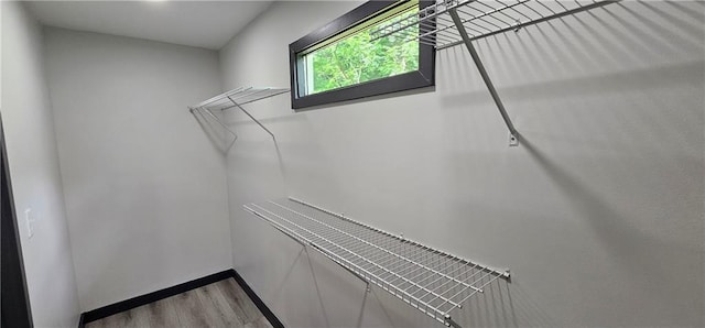 185 Glenrose Cir SW, Atlanta, GA 30354 - walk in closet featuring wood finished floors