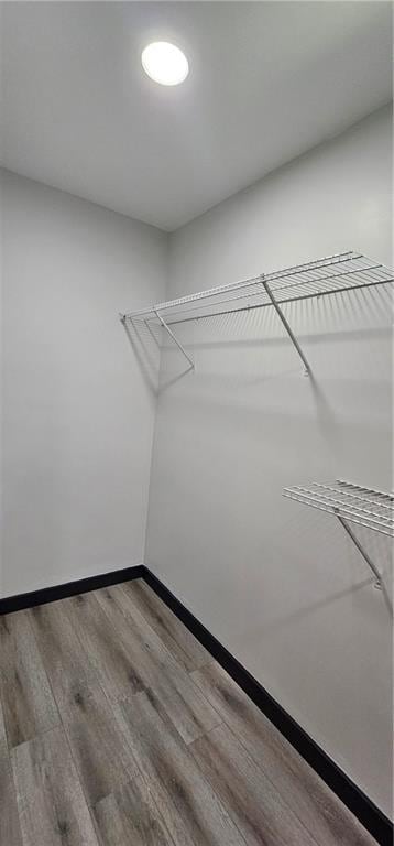 185 Glenrose Cir SW, Atlanta, GA 30354 - walk in closet featuring wood finished floors