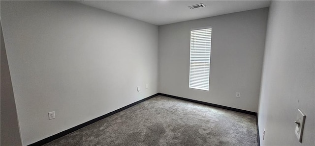185 Glenrose Cir SW, Atlanta, GA 30354 - empty room with healthy amount of natural light, carpet, and baseboards