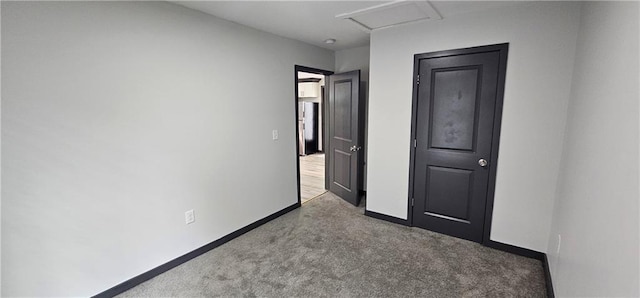 185 Glenrose Cir SW, Atlanta, GA 30354 - unfurnished bedroom featuring carpet, baseboards, and attic access