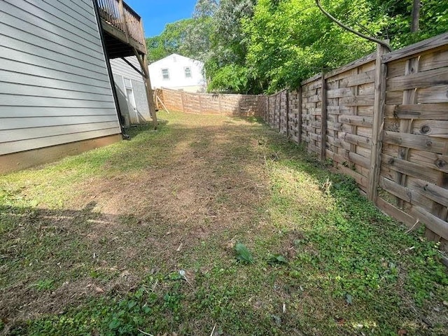 view of yard featuring a fenced backyard