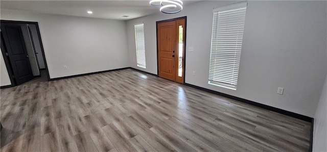 185 Glenrose Cir SW, Atlanta, GA 30354 - spare room with baseboards, wood finished floors, recessed lighting, and plenty of natural light