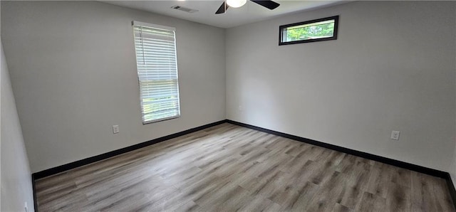185 Glenrose Cir SW, Atlanta, GA 30354 - empty room featuring a ceiling fan, wood finished floors, and baseboards