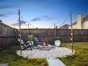 view of yard featuring an outdoor fire pit