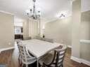 dining space featuring a notable chandelier