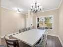 dining space featuring an inviting chandelier