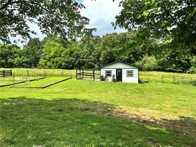 311 Langston Rd SE, Calhoun, GA 30701 - view of yard featuring an outbuilding and a view of trees