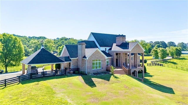 311 Langston Rd SE, Calhoun, GA 30701 - view of front facade with a chimney