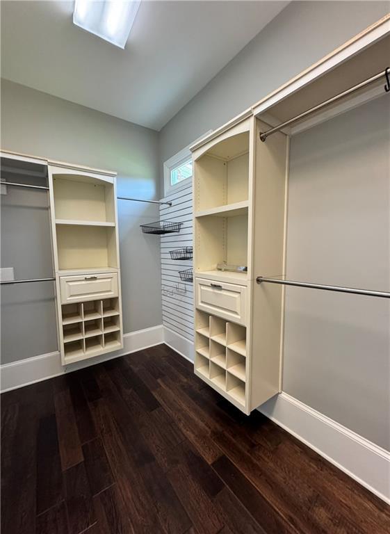 311 Langston Rd SE, Calhoun, GA 30701 - spacious closet with dark wood-type flooring