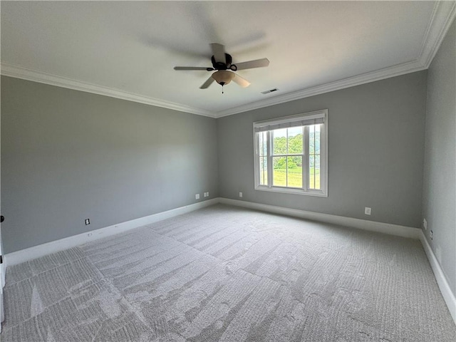 311 Langston Rd SE, Calhoun, GA 30701 - spare room featuring ornamental molding, ceiling fan, light carpet, and baseboards