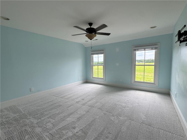 311 Langston Rd SE, Calhoun, GA 30701 - spare room featuring carpet, ceiling fan, and baseboards