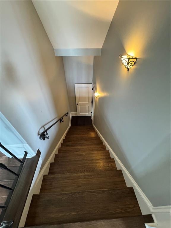 311 Langston Rd SE, Calhoun, GA 30701 - stairs featuring wood finished floors and baseboards