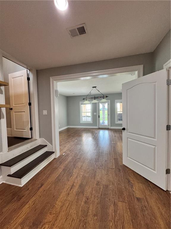 311 Langston Rd SE, Calhoun, GA 30701 - unfurnished room featuring wood finished floors and baseboards
