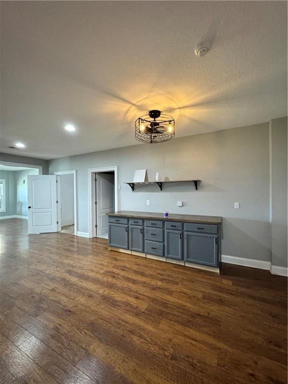 311 Langston Rd SE, Calhoun, GA 30701 - kitchen featuring dark wood-style flooring, baseboards, gray cabinetry, recessed lighting, and open shelves