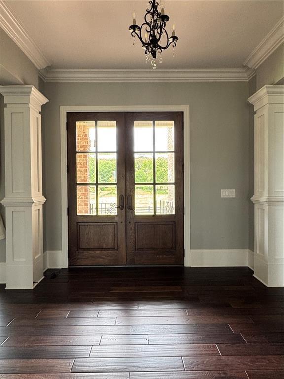 311 Langston Rd SE, Calhoun, GA 30701 - doorway to outside with dark wood-type flooring, crown molding, a chandelier, baseboards, and french doors