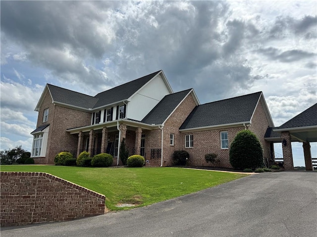 311 Langston Rd SE, Calhoun, GA 30701 - view of front of house featuring brick siding and a front lawn
