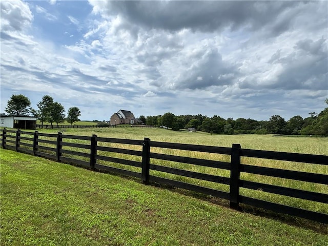 311 Langston Rd SE, Calhoun, GA 30701 - gate featuring a rural view and an outdoor structure