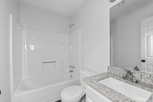 2571 Hamill Dr, Buford, GA 30519 - bathroom featuring toilet, vanity, and tub / shower combination