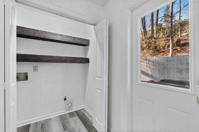 2571 Hamill Dr, Buford, GA 30519 - laundry area with hookup for a washing machine, electric dryer hookup, wood finished floors, and baseboards