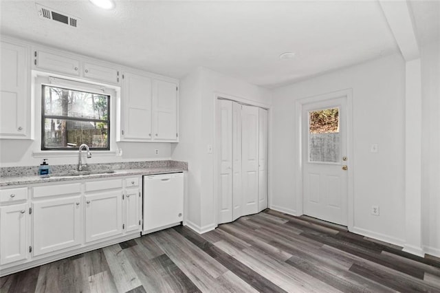 2571 Hamill Dr, Buford, GA 30519 - kitchen featuring a sink, white dishwasher, dark wood-style floors, and white cabinets