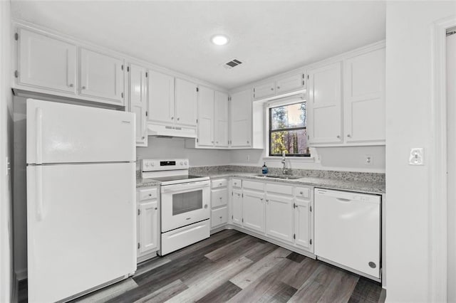2571 Hamill Dr, Buford, GA 30519 - kitchen with white appliances, under cabinet range hood, a sink, white cabinets, and recessed lighting