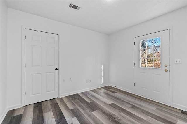 2571 Hamill Dr, Buford, GA 30519 - empty room featuring wood finished floors and baseboards