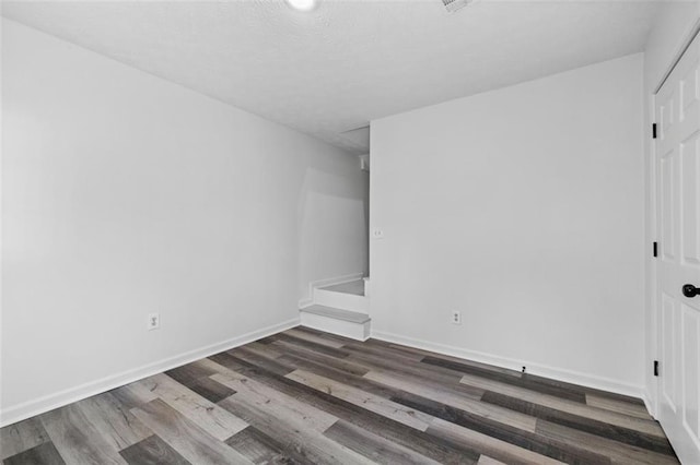 2571 Hamill Dr, Buford, GA 30519 - unfurnished room featuring wood finished floors and baseboards