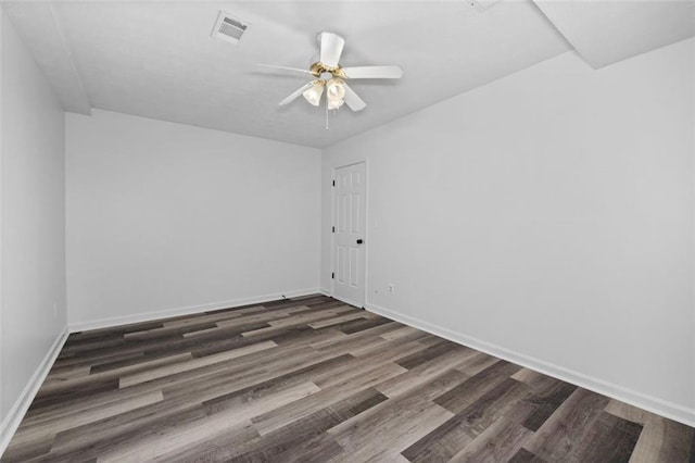 2571 Hamill Dr, Buford, GA 30519 - empty room featuring ceiling fan, wood finished floors, and baseboards