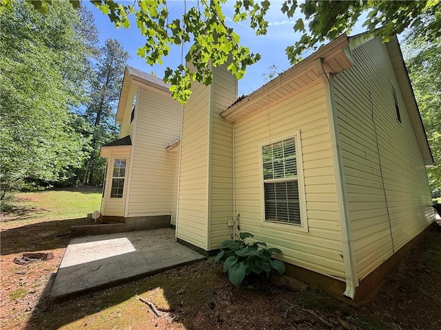 view of home's exterior featuring a patio