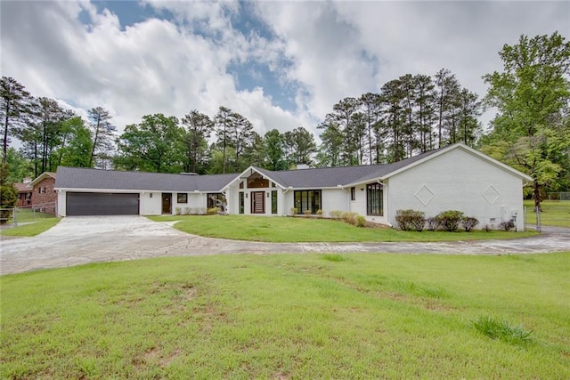 4700 Cascade Rd SW, Atlanta, GA 30331 - view of front facade with a garage, concrete driveway, a front lawn, and view of scattered trees