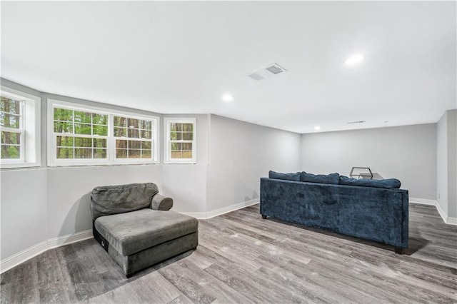 642 Towering Pine Trl, Lawrenceville, GA 30045 - living area with wood finished floors, baseboards, and recessed lighting