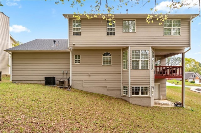 642 Towering Pine Trl, Lawrenceville, GA 30045 - rear view of property with a yard and a wooden deck