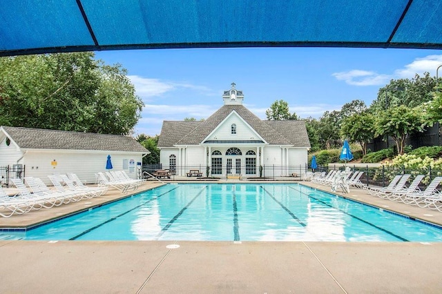 642 Towering Pine Trl, Lawrenceville, GA 30045 - community pool featuring fence and a patio area