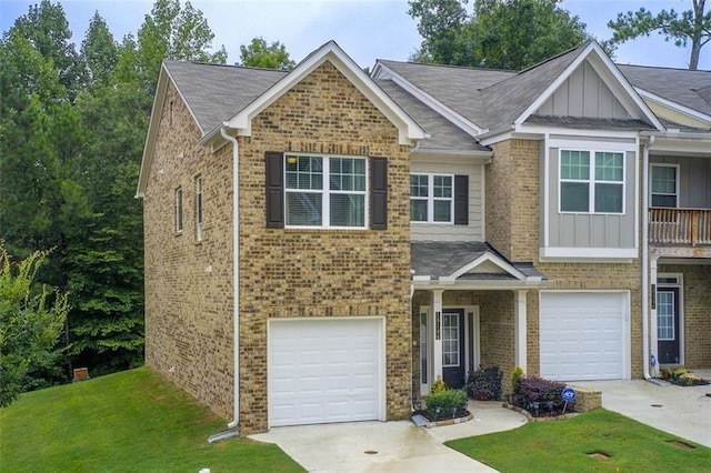 view of front facade featuring concrete driveway, brick siding, board and batten siding, and an attached garage