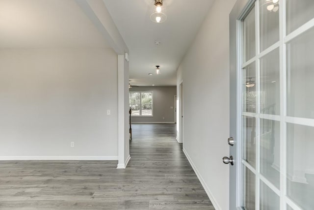 hall with wood-type flooring