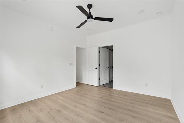 1500 Murphy Ave SW, Atlanta, GA 30310 - spare room featuring light wood-style floors, baseboards, and a ceiling fan