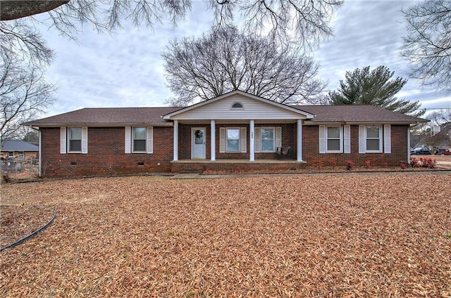 ranch-style house featuring a porch