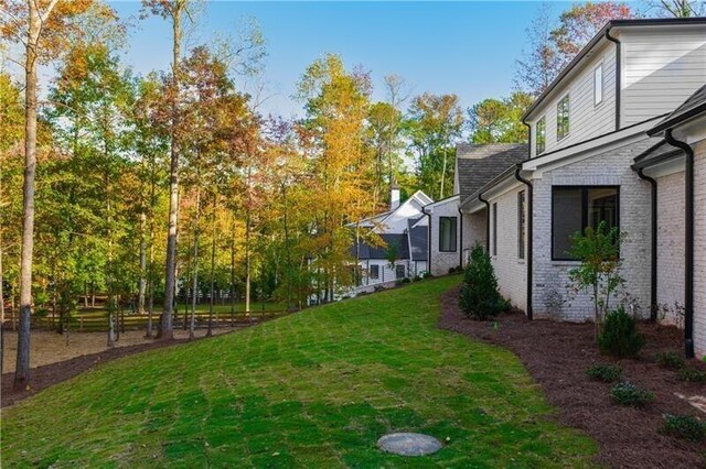 view of side of property featuring a garage