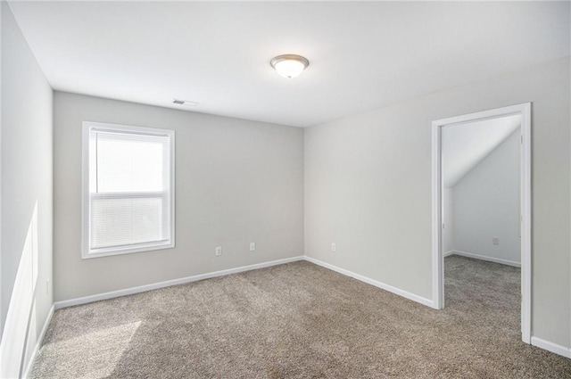 view of carpeted spare room