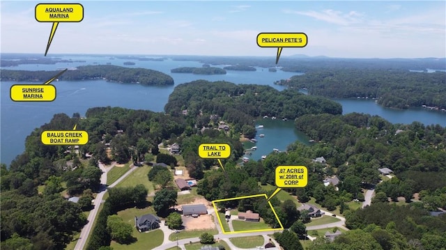 4625 Ben Hill Dr, Oakwood, GA 30566 - aerial view of property and surrounding area featuring a heavily wooded area, a nearby body of water, and property parcel outlined