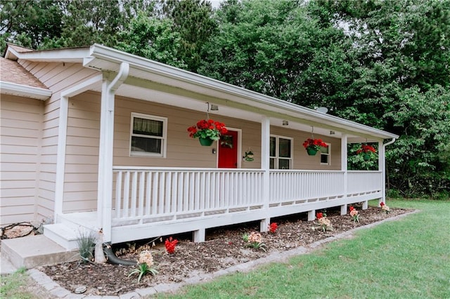 4625 Ben Hill Dr, Oakwood, GA 30566 - property entrance featuring a porch and a yard